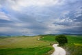 Winding road to a destination in Tuscany Royalty Free Stock Photo